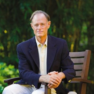 Dr. Perlmutter sitting on a bench